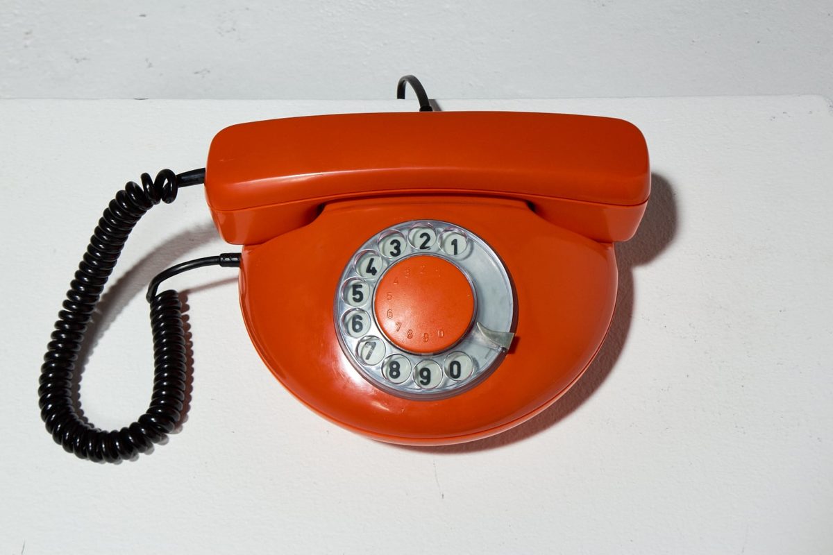 TE058 Ron Orange Rotary Phone Prop Rental | ACME Brooklyn