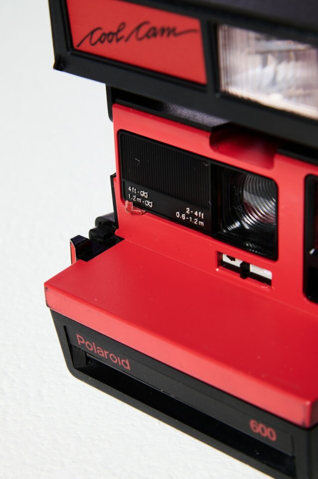 VC064 Red Polaroid Sun 600 Camera Prop Rental - ACME Brooklyn