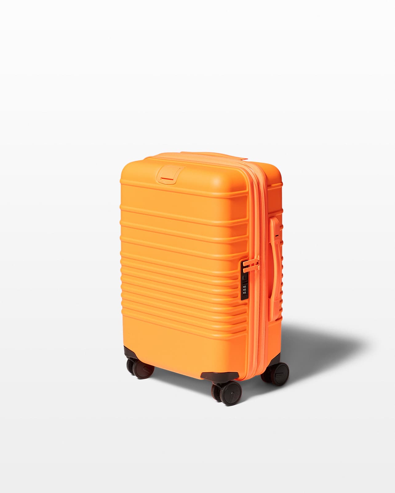 TL208 Curtis Orange 14” Small Rolling Suitcase Prop Rental ACME Brooklyn